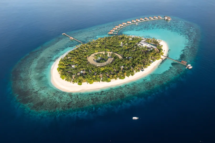 Hadahaa from the air, ringed by its house reef